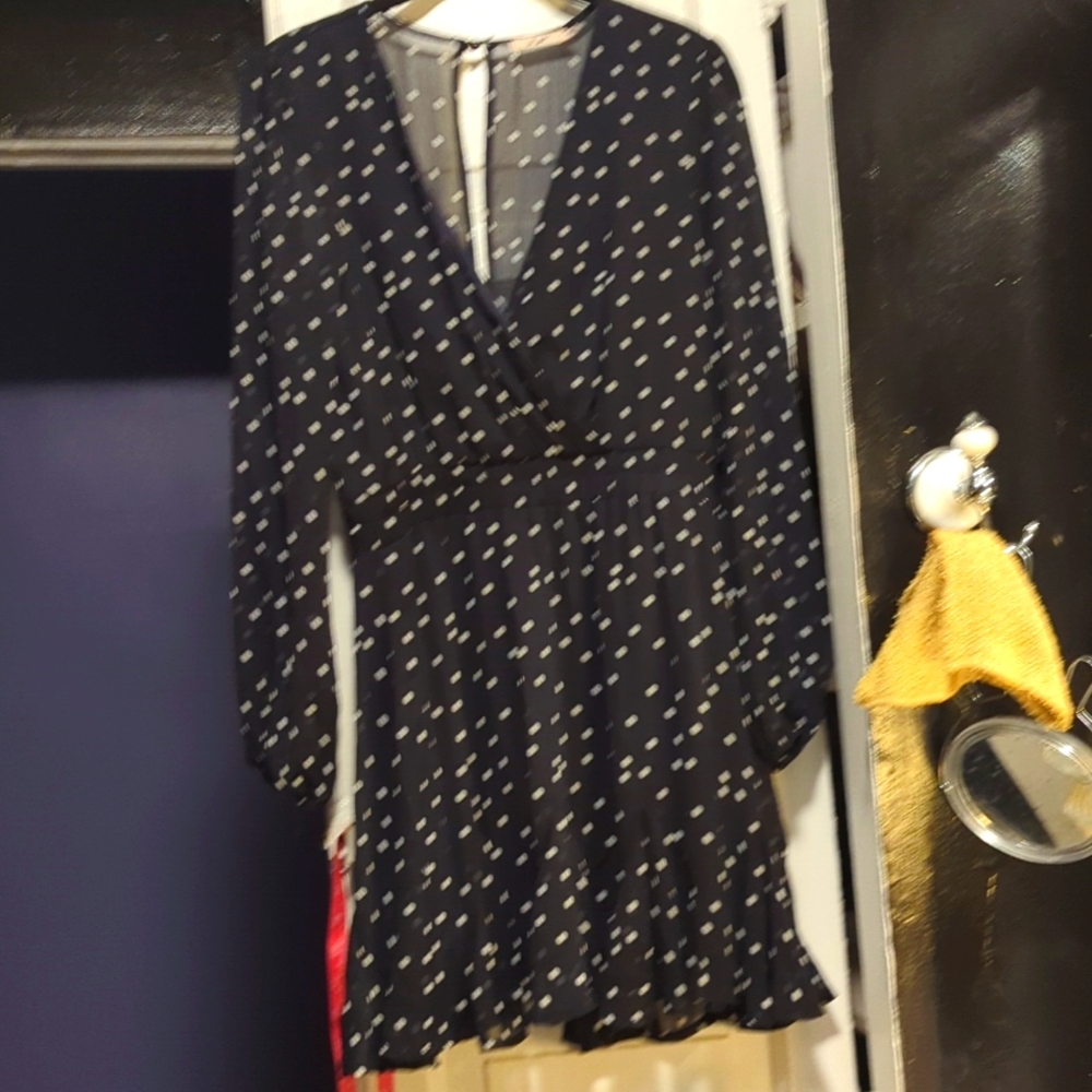 Black and white polka dot dress.
